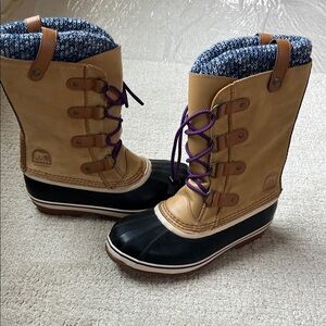 Sorel Tan and Black Boots with Purple Laces